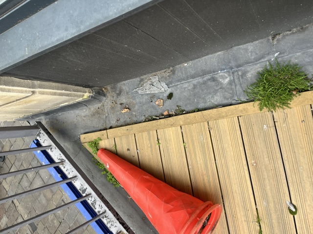 Exterior mezzanine decking and perimeter area inspected during a needle sweep in central Bristol